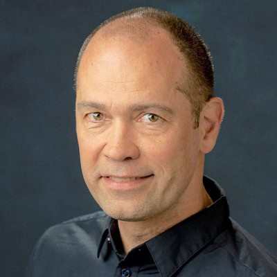 High-resolution portrait of a man at Boyce Thompson Institute, emphasizing scientific research and academic excellence in plant biology and genetics.