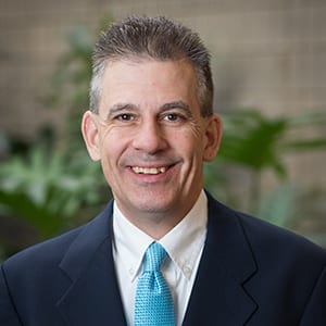 Innovative researcher at Boyce Thompson Institute, focusing on plant science and biotechnology, with a welcoming smile and professional attire.